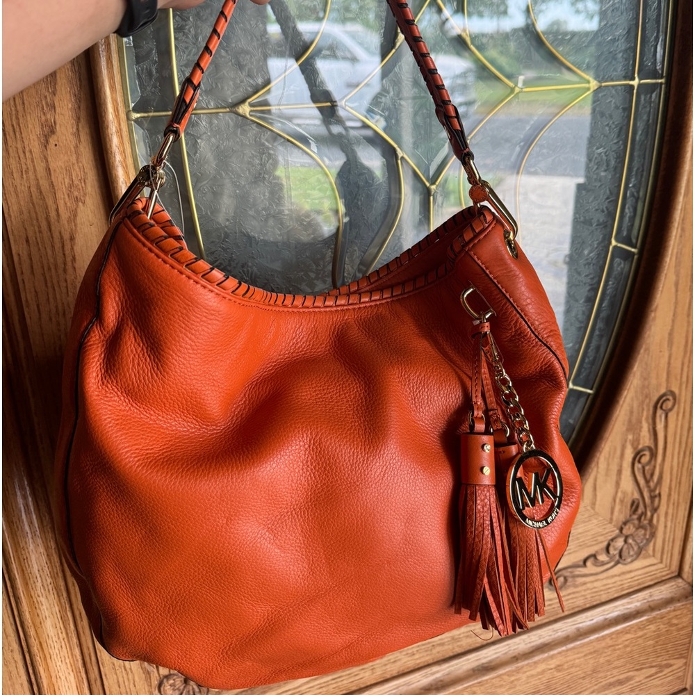 Adorable orange Michael Kors purse